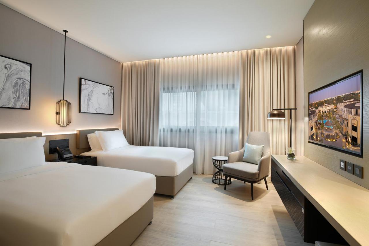 Al Ain Rotana Hotel Exterior photo Deluxe Room