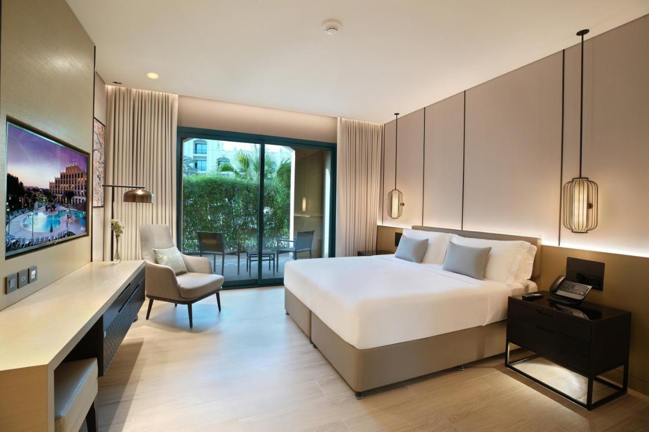 Al Ain Rotana Hotel Exterior photo Deluxe Room