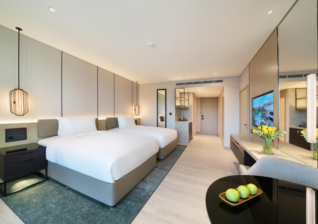 Al Ain Rotana Hotel Exterior photo Deluxe Room