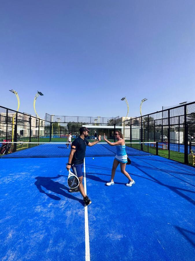 Al Ain Rotana Hotel Exterior photo A paddle tennis court