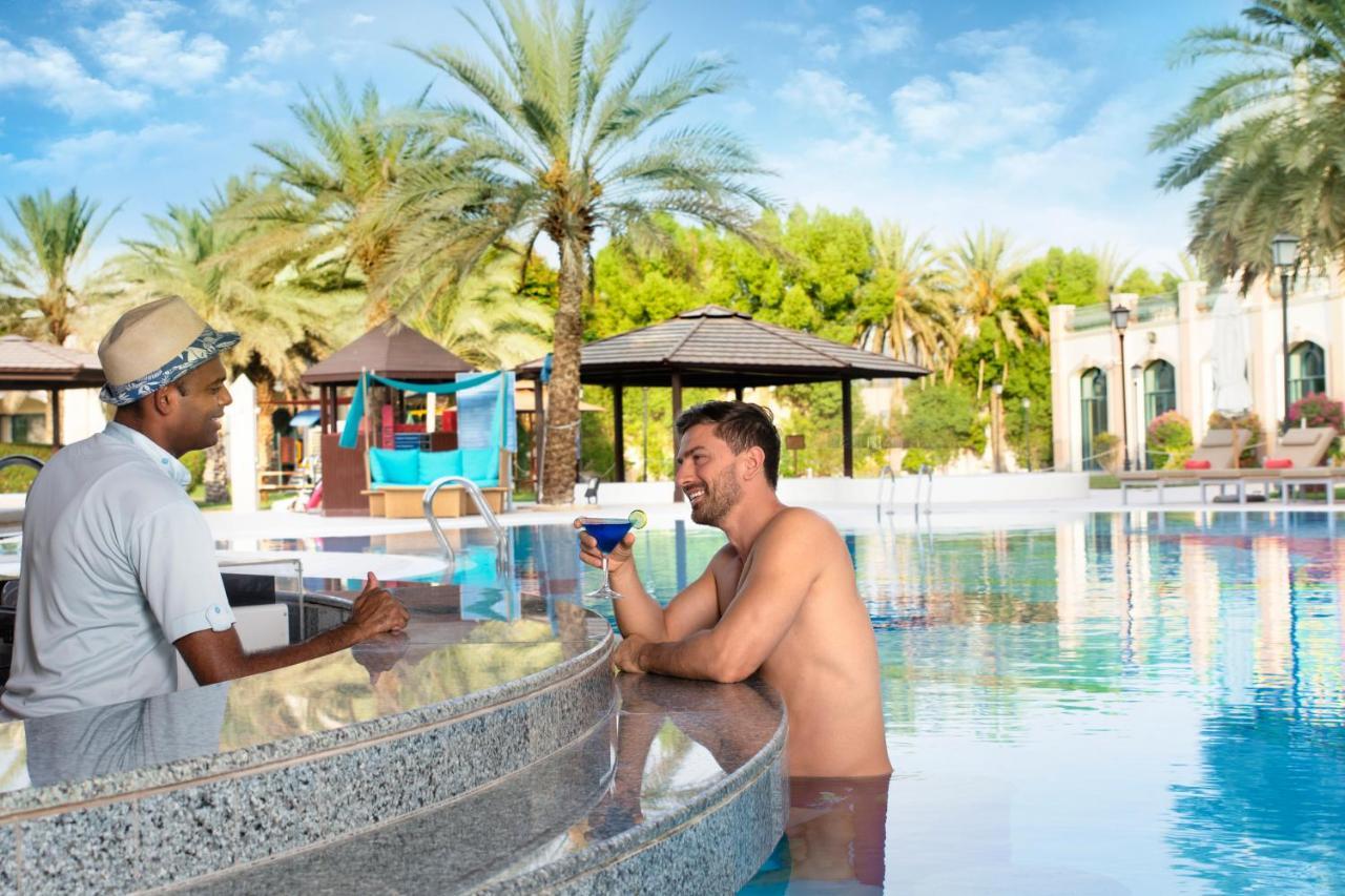 Al Ain Rotana Hotel Exterior photo The swimming pool at the resort