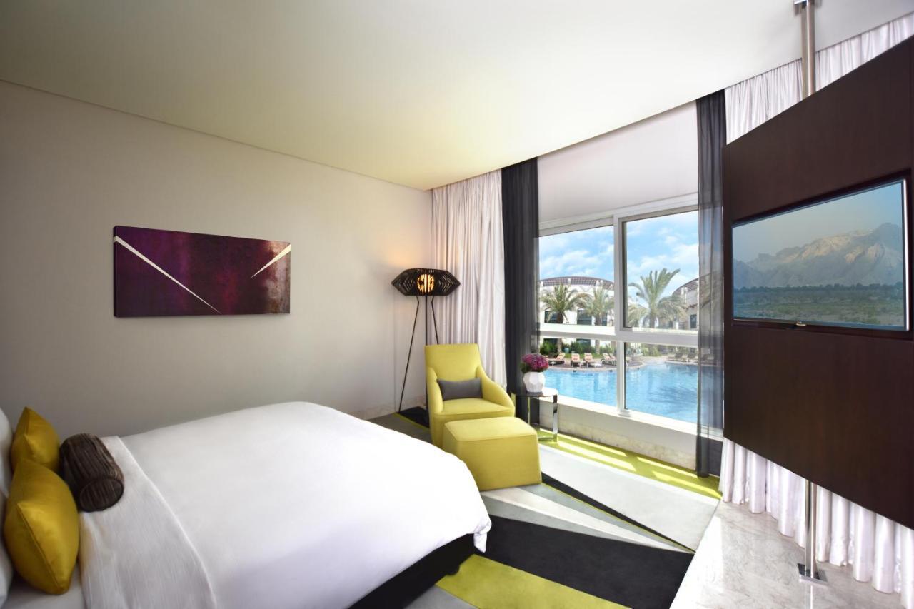 Al Ain Rotana Hotel Exterior photo Deluxe room